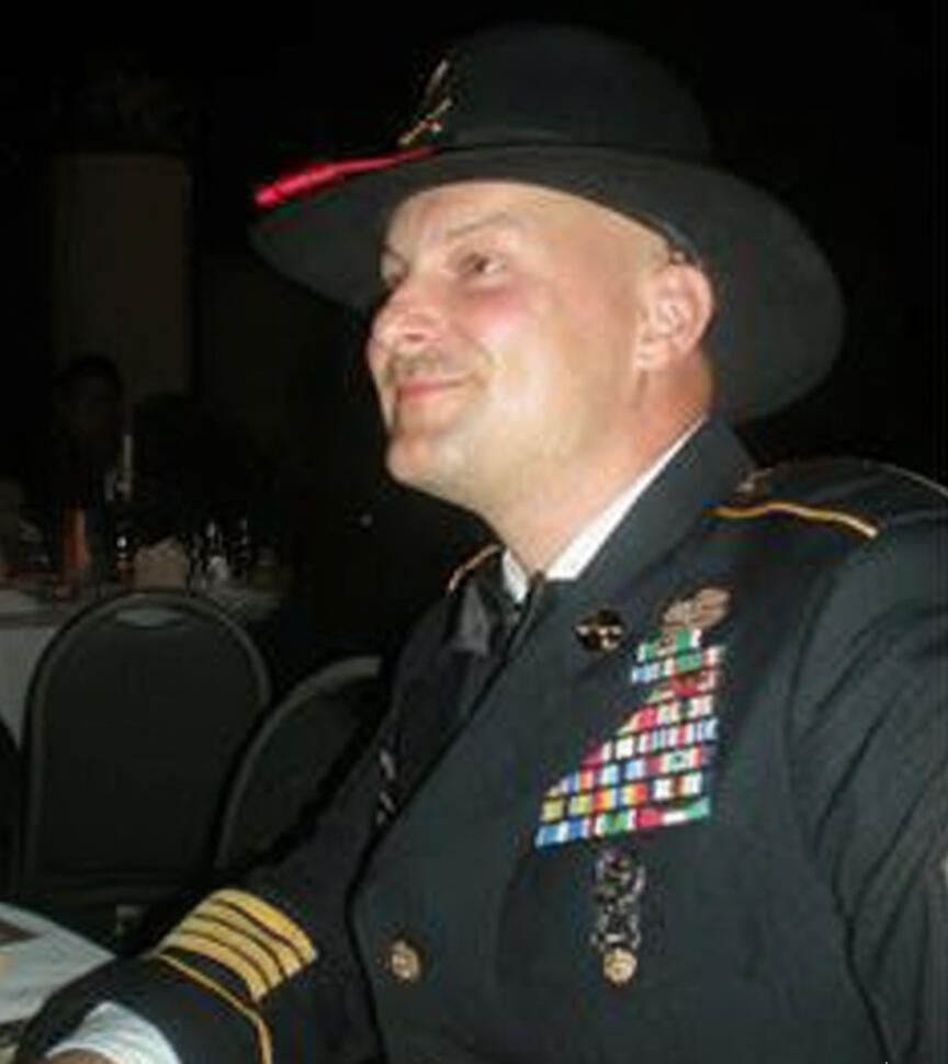 PJ in Cavalry stetson and dress blue Army uniform